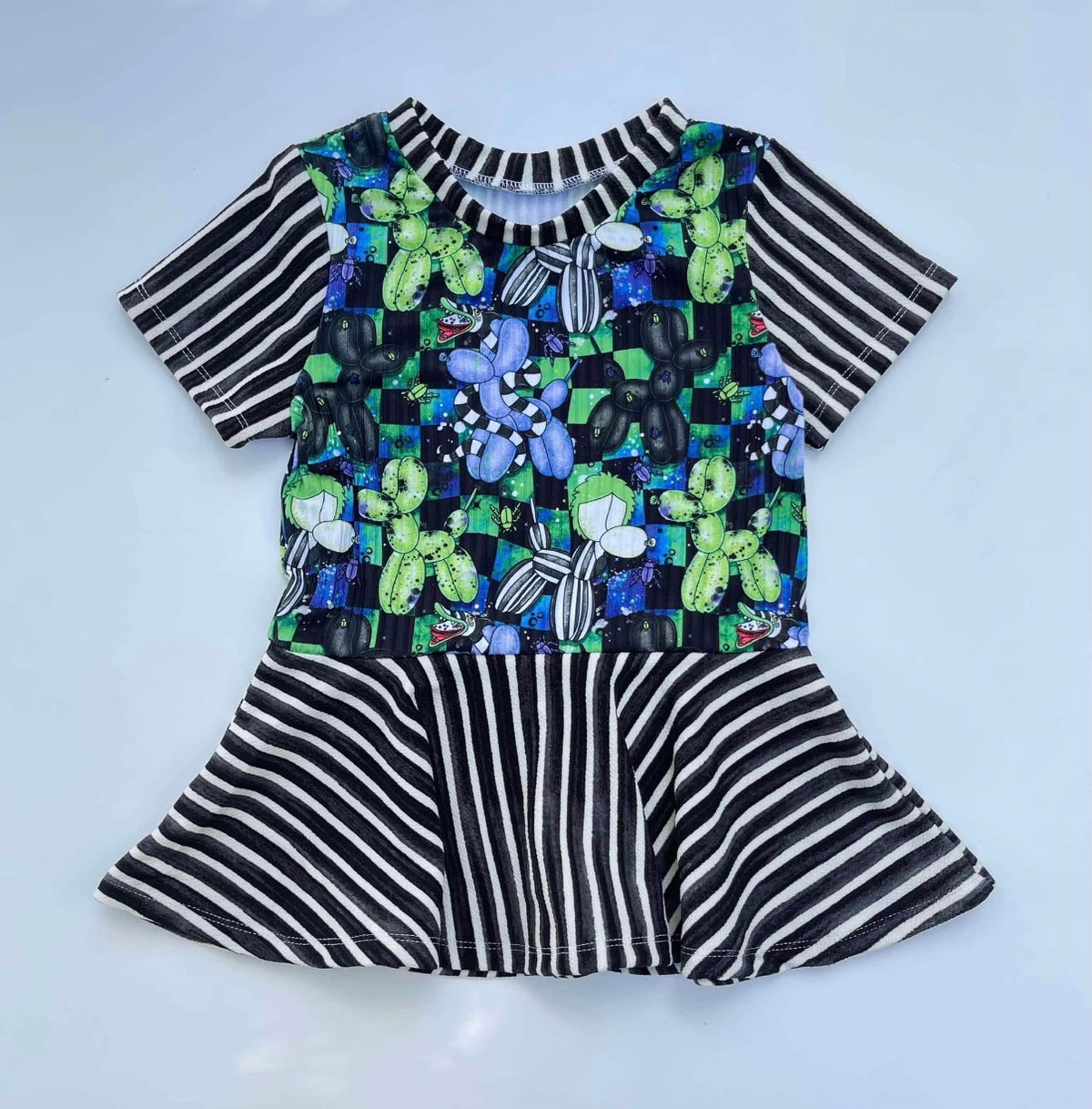 MYSTERY PEPLUM TOP